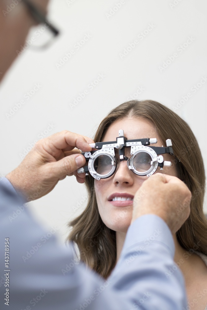 Woman having eye test