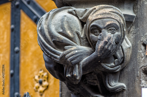 Gothic art. Stone sculpture of a woman on fasade of Town hall building in Munich,Bavaria,Germany