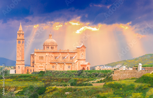 Ta Pinu church sanctuary on Gozo island illuminated by sunset light, in Malta - Europe