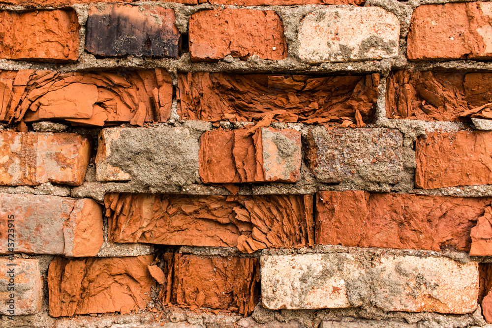 Fragment of old brick wall made of red brick. Fragment of old brick wall made of red brick.
