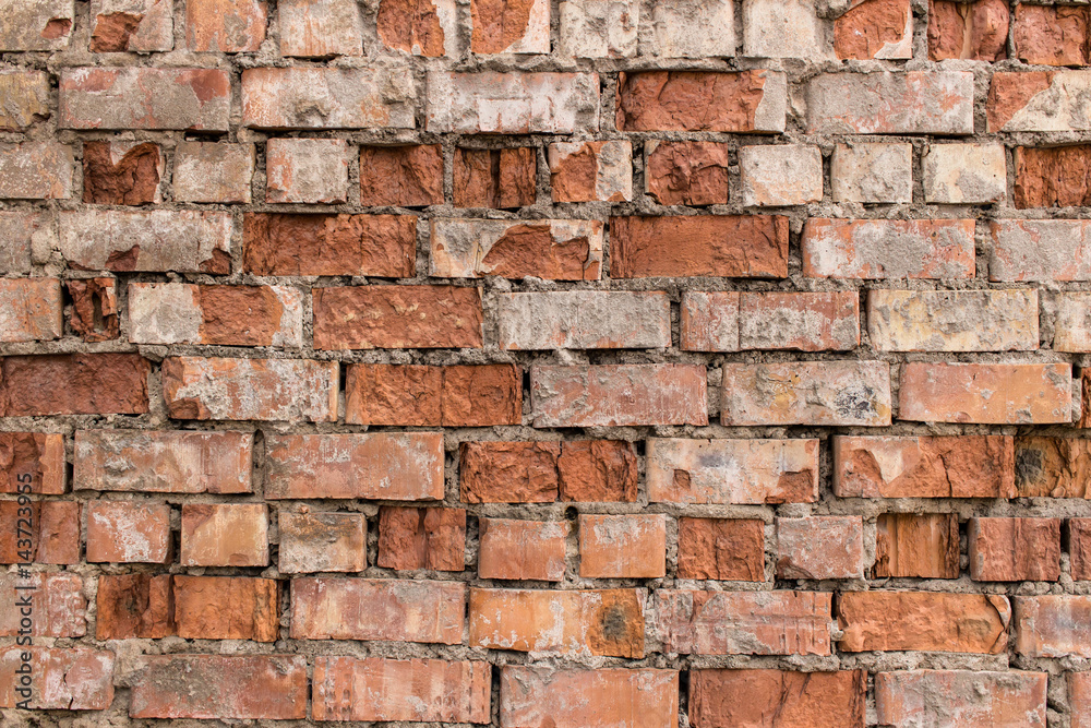 Fragment of old brick wall made of red brick. Fragment of old brick wall made of red brick.