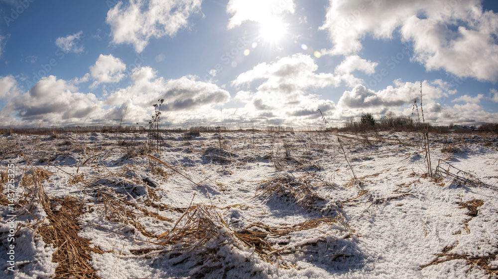 Snowy field on a sunny spring day Snowy field on a sunny spring day
