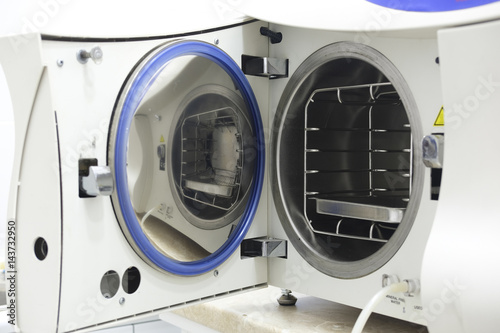 Medical sterilizer with open door close up