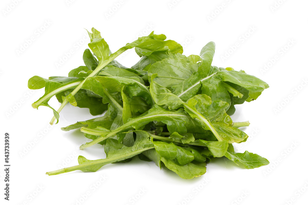 Close up studio shot of green fresh rucola leaves isolated on white background. Rocket salad or arugula. Close up studio shot of green fresh rucola leaves isolated on white background. Rocket salad or arugula.