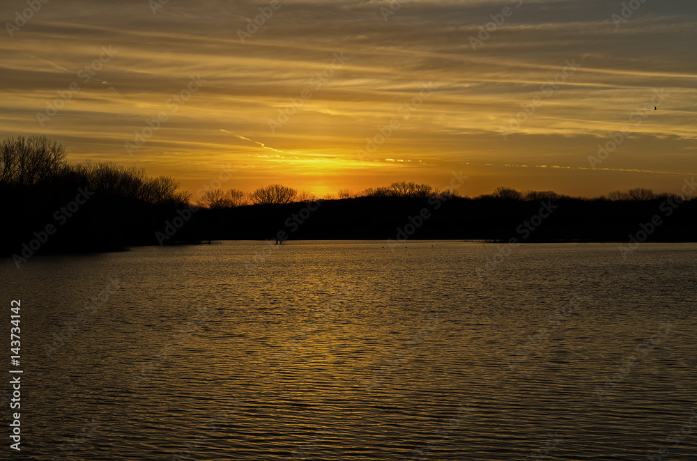 Sunrise over a lake near the Des Moines river Sunrise over a lake near the Des Moines river