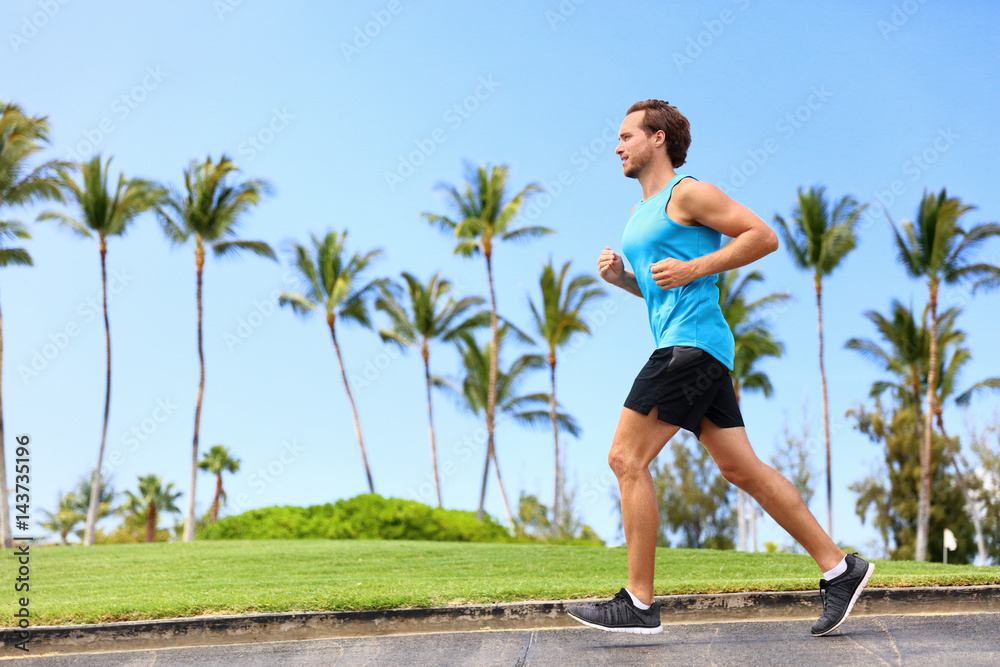 Fitness man athlete runner jogging on park sidewalk. Person running working  out living an active lifestyle training cardio in summer in sportswear and  shoes. Full body. Stock Photo | Adobe Stock