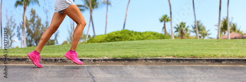 Athlete legs running on park sidewalk. Active lifestyle runner jogging banner panorama crop of lower body of woman running in summer background.