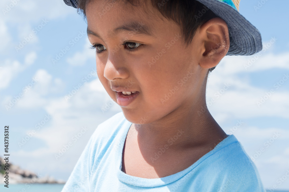 Close up of cute asian boy at sea Close up of cute asian boy at sea