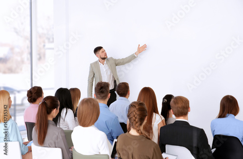 Business trainer giving pre...
