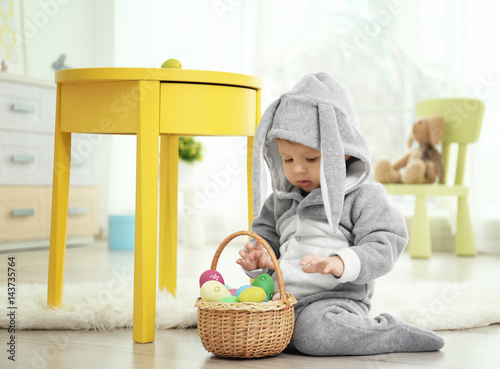 Cute little baby in bunny c...