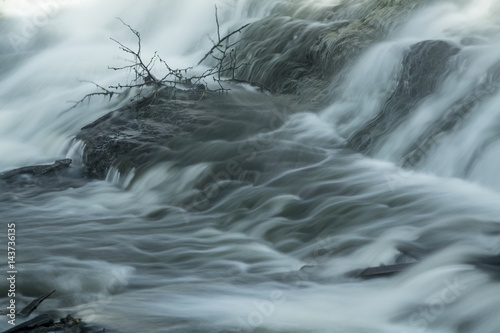 Whitewater rapids below the dam at Union Pond, Manchester, Connecticut.