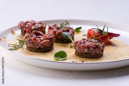 Meat sandwiches tartar on a white background