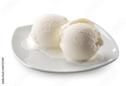 Two natural melted ice cream balls close-up isolated on white background
