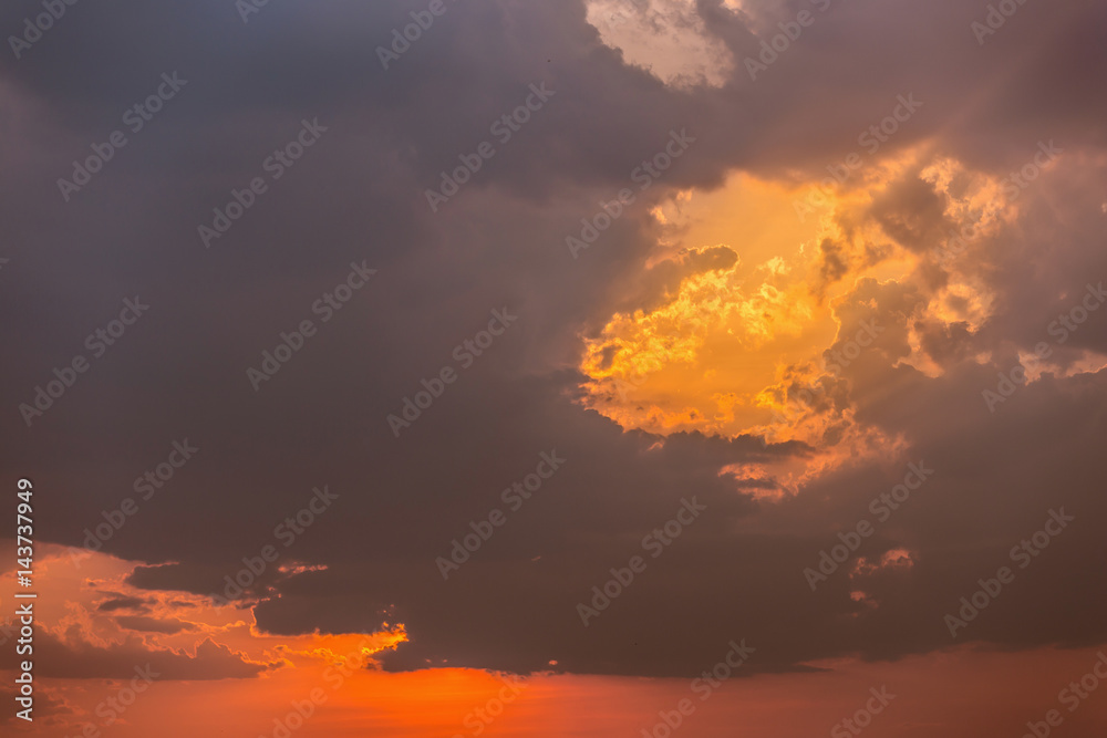 Colorful dramatic sky with cloud at sunset.Sky with sun background.