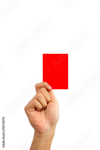 Red card in a hand in front of a white background