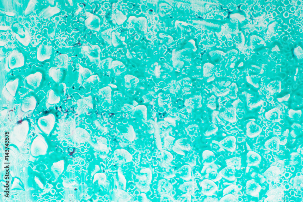 Textured turquoise background free space. Curly napkin painted with blue nail polish. Abstract art, design, beauty, ocean, creative, decorative cosmetics concept Textured turquoise background free space. Curly napkin painted with blue nail polish. Abstract art, design, beauty, ocean, creative, decorative cosmetics concept