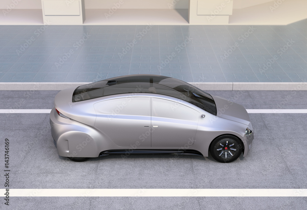 Silver autonomous car driving on the road. 3D rendering image. Silver autonomous car driving on the road. 3D rendering image.