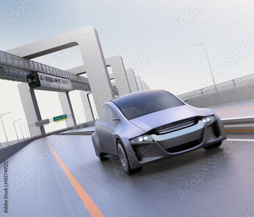 Silver autonomous car driving on the highway with monorail on background. 3D rendering image. 