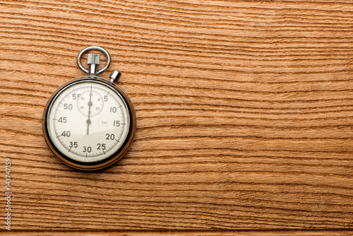 stopwatch on a wooden table