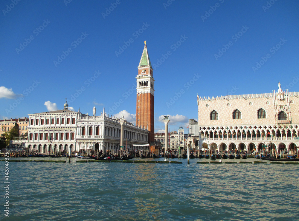 The Doge’s Palace and the Bell Tower Campanile as seen from Grand Canal of Venice, Italy 