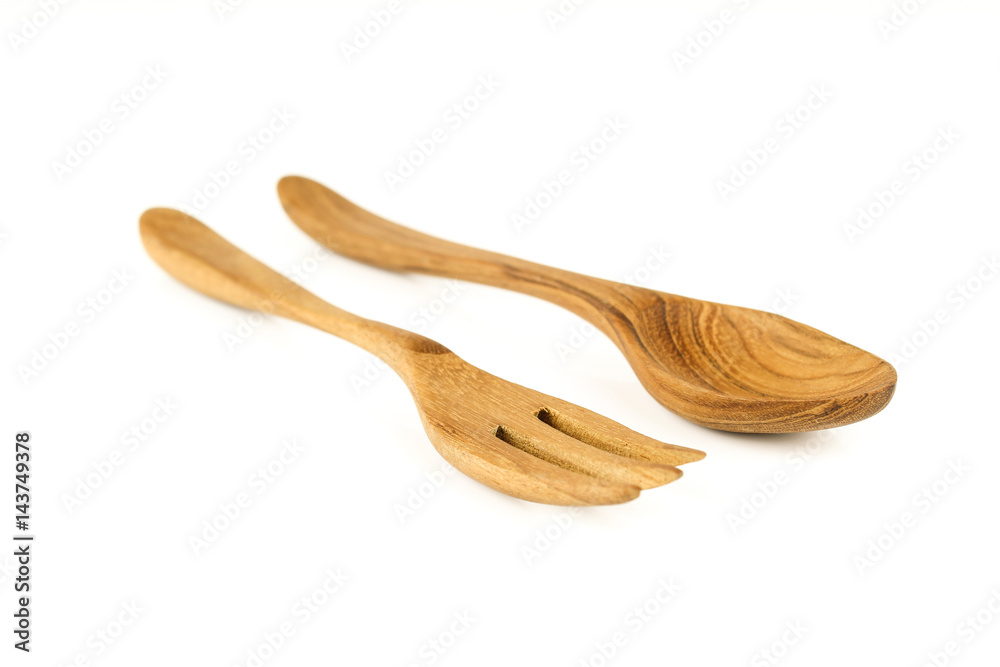 Brown wooden spoon and fork isolated on white background