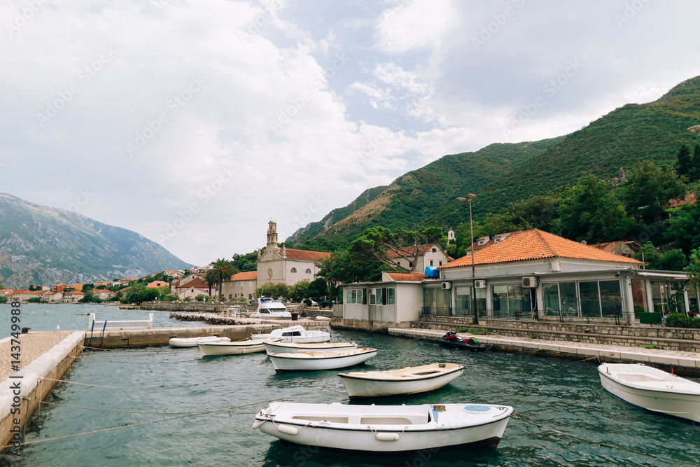 Prcanj, Montenegro The Bay of Kotor. Fishing boats on the dock.