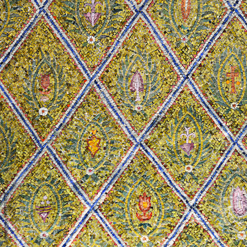 The wall in the temple of colorful mosaic