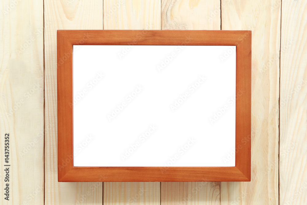 Brown wood frame on wooden floor. Brown wood frame on wooden floor.