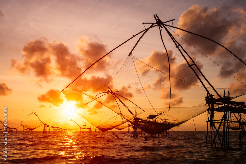 Silhouette of Square nets and sky background at sunrise, Pakpra, phattalung, Thailand.
