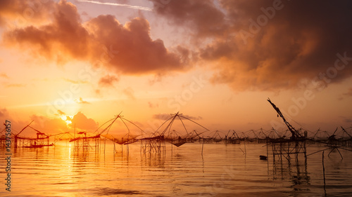 Silhouette of Square nets and sky background at sunrise, Pakpra, phattalung, Thailand.
