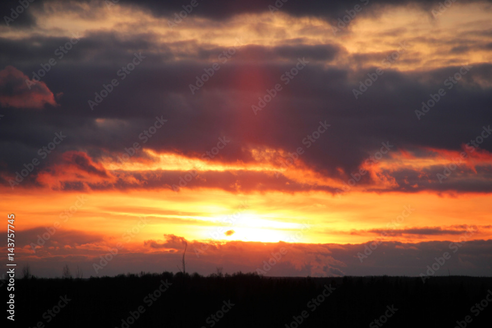 The golden rays of the sun through the clouds The golden rays of the sun through the clouds