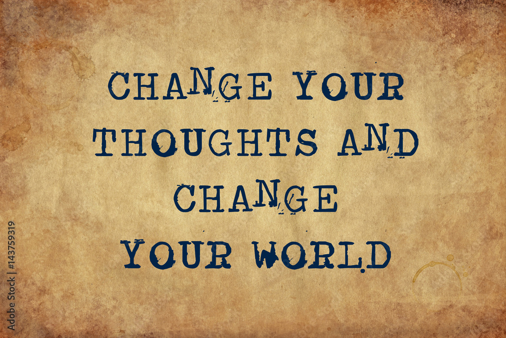 Inspiring motivation quote of change your thoughts and change your world with typewriter text. Distressed Old Paper with Typing image.