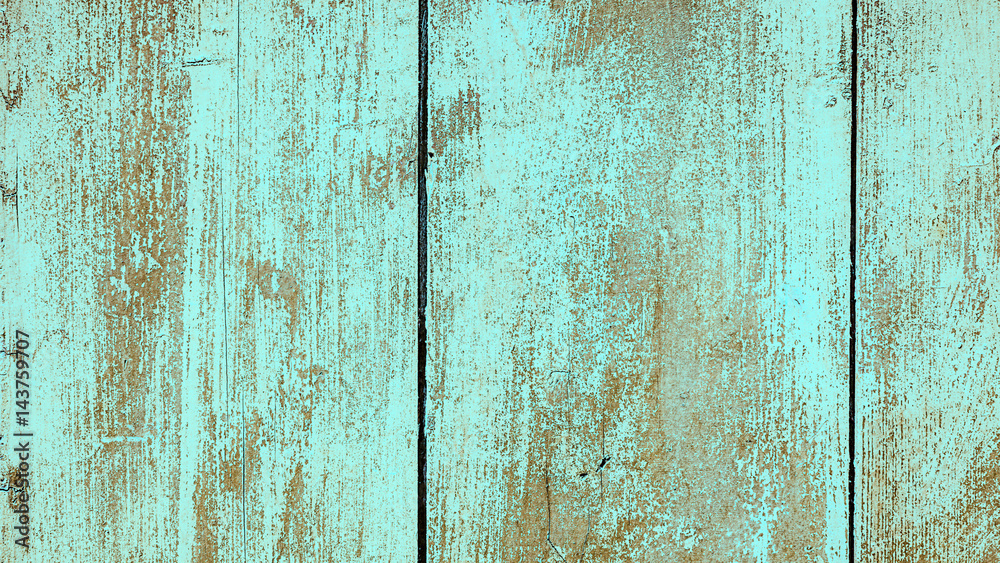 Old wooden wall painted in turquoise color, detailed background photo texture. Wood plank fence close up.