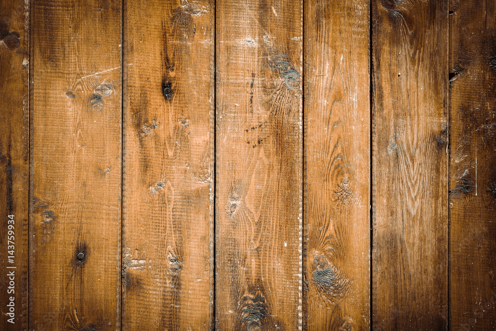Old brown wooden wall, detailed background photo texture. Wood plank fence close up.