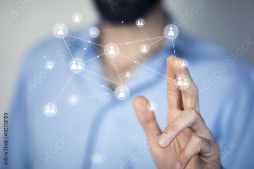 Businessman hand holding virtual social media buttons