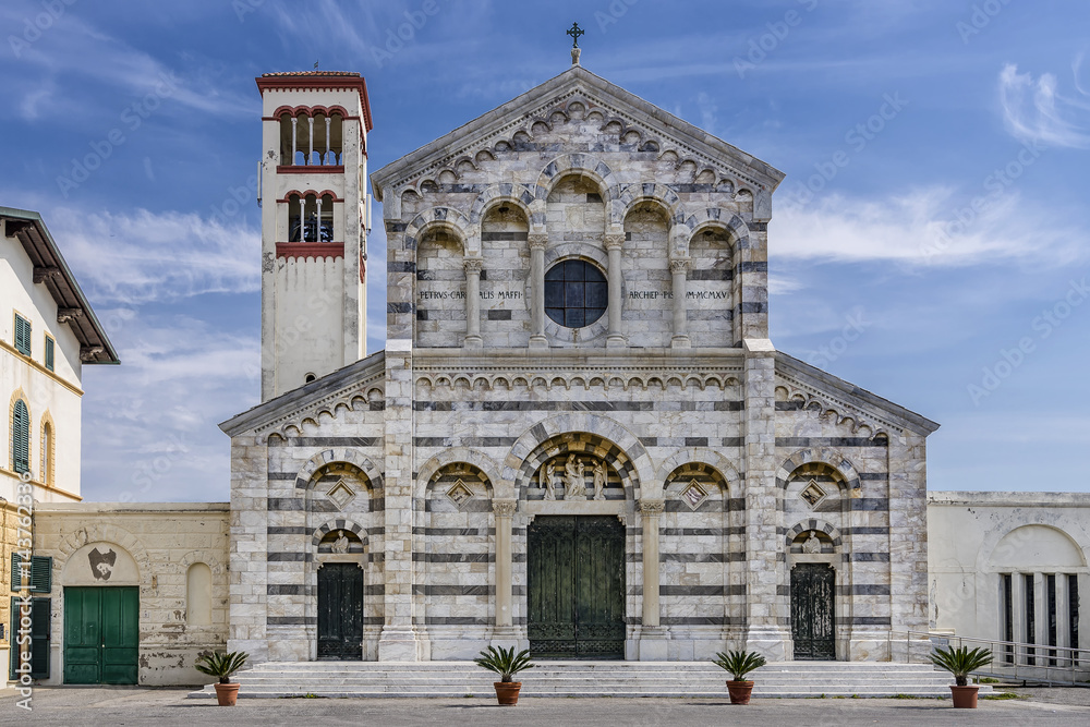 The beautiful facade of the church Chiesa di Santa Maria Ausiliatrice, Marina di Pisa, Tuscany, Italy
