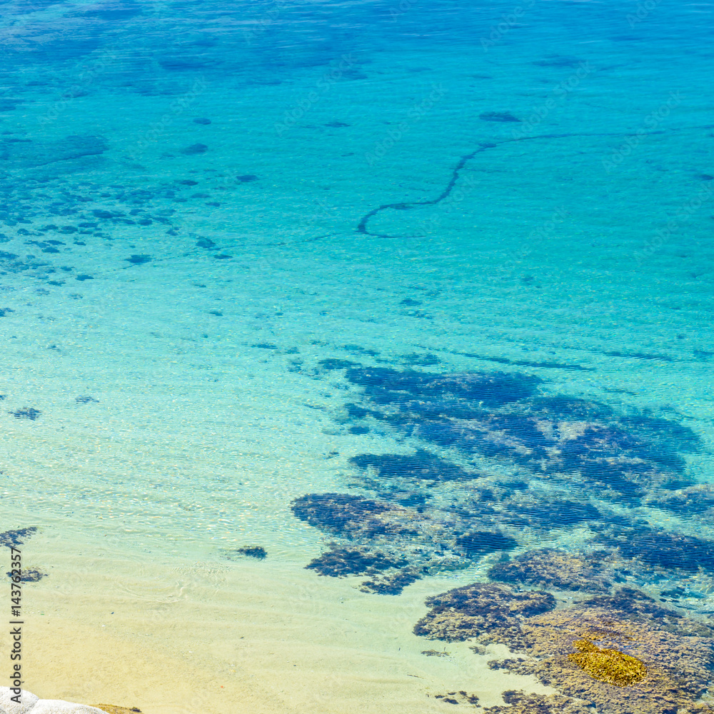 Aegean sea bay with clear turquoise water. Photo from Kalamitsi village, Sitonia, Halkidiki, Macedonia, Northern Greece.