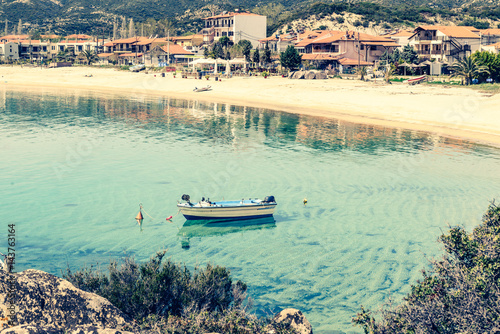 Boat on Kalamitsi beach. Kalamitsi is a romantic gateway for families, couples and adventurers. Location: Sitonia, Halkidiki, Macedonia, Northern Greece.