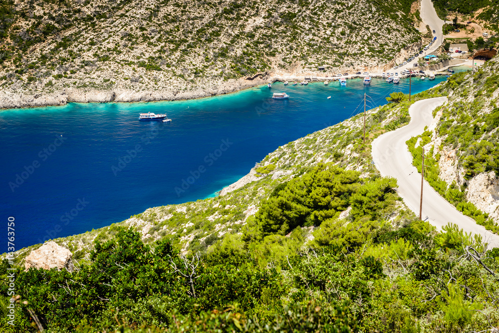 Boats and turquoise water in the blue lagoon of Porto Vromi, Zakynthos (Zante) Island, Greece