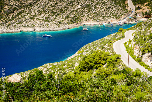 Boats and turquoise water in the blue lagoon of Porto Vromi, Zakynthos (Zante) Island, Greece photo