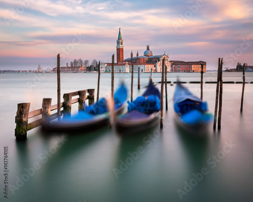 Lagoon, Gondolas and San Giorgio Maggiore Church in Venice, Italy