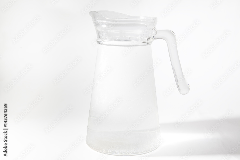 Jug of water with shadow and selective focus Jug of water with shadow and selective focus