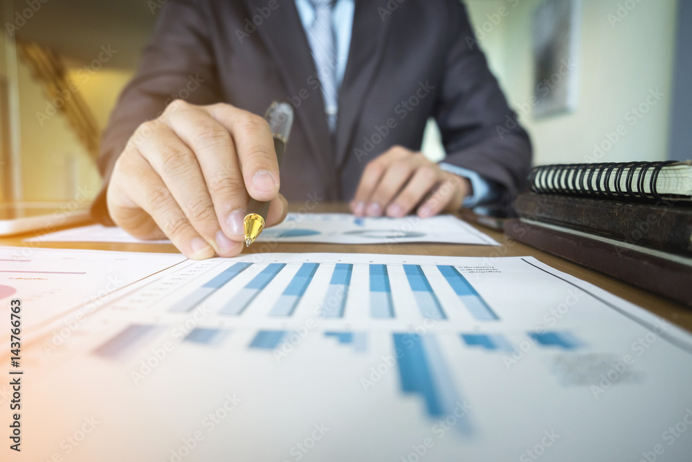 businessman hand working with new document plan and business strategy as concept. businessman hand working with new document plan and business strategy as concept.