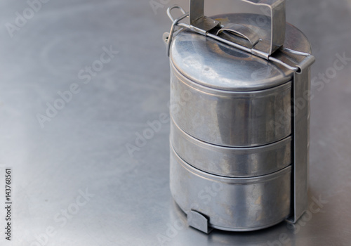 COLOR PHOTO OF OLD STAINLESS STEEL LUNCH BOX 