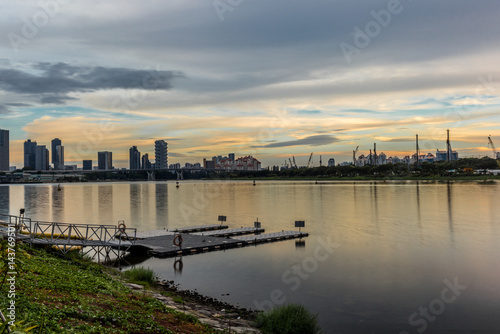 Reflections on the quiet sea of the marina in Singapore - 1