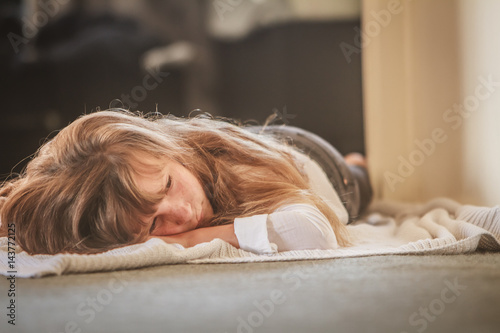 indoor portrait of young preteen girl at home