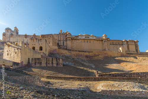 The impressive landscape and cityscape at Amber Fort, famous travel destination in Jaipur, Rajasthan, India. Wide angle view from below.