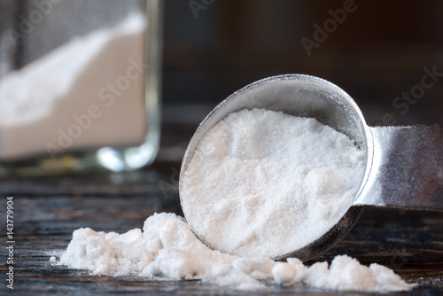 Fotografie Arrowroot Powder Spilled from a Teaspoon