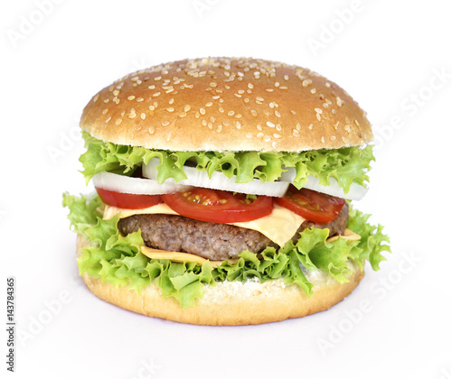 Fresh, delicious burger or cheeseburger with salad, onion rings, tomato and grilled beef. Isolated hamburger, isolated on white background.