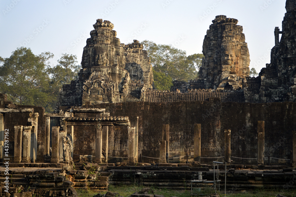 Towers with the faces of the Bayon temple in Cambodia.